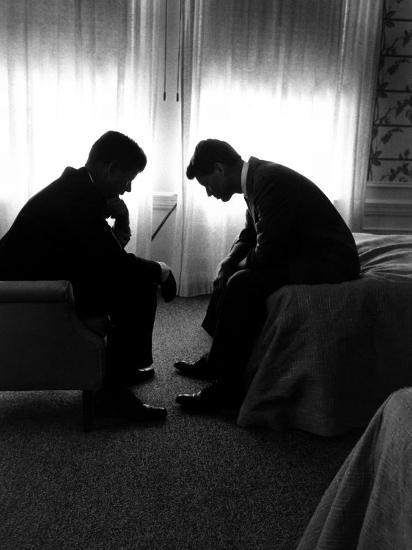 Jack Kennedy Conferring with His Brother and Campaign Organizer Bobby Kennedy in Hotel Suite