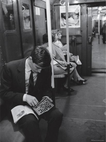 Chess Champion Bobby Fischer Working on His Moves During a Subway Ride
