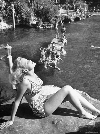 Young Girl Sunbathing at the Venetian Pool