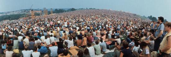 Seated Crowd Listening to Musicians Perform at Woodstock Music Festival