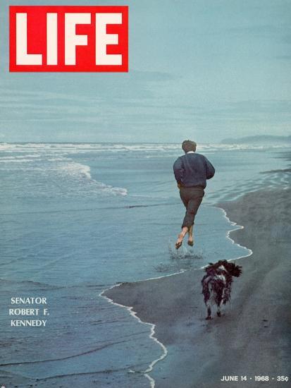 Robert F. Kennedy Jogging on the Beach with his Dog, June 14, 1968