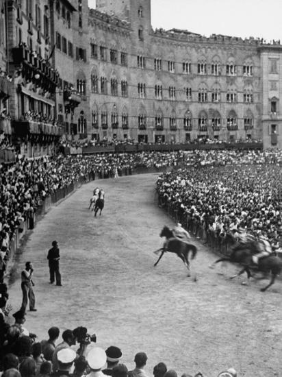 People Watching Horse Race that Is Traditional Part of the Palio Celebration